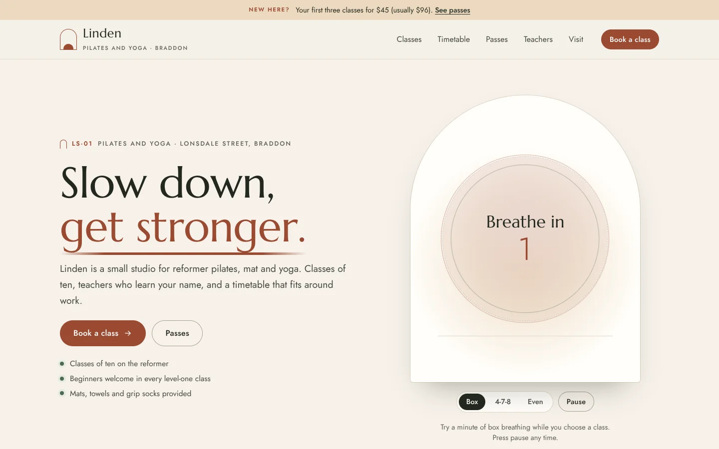 Exhale template home page: a calm serif headline 'Slow down, get stronger.' with the last words in terracotta over a long tapering line, beside a tall cream arch holding a breathing circle that reads 'Breathe in' with a count